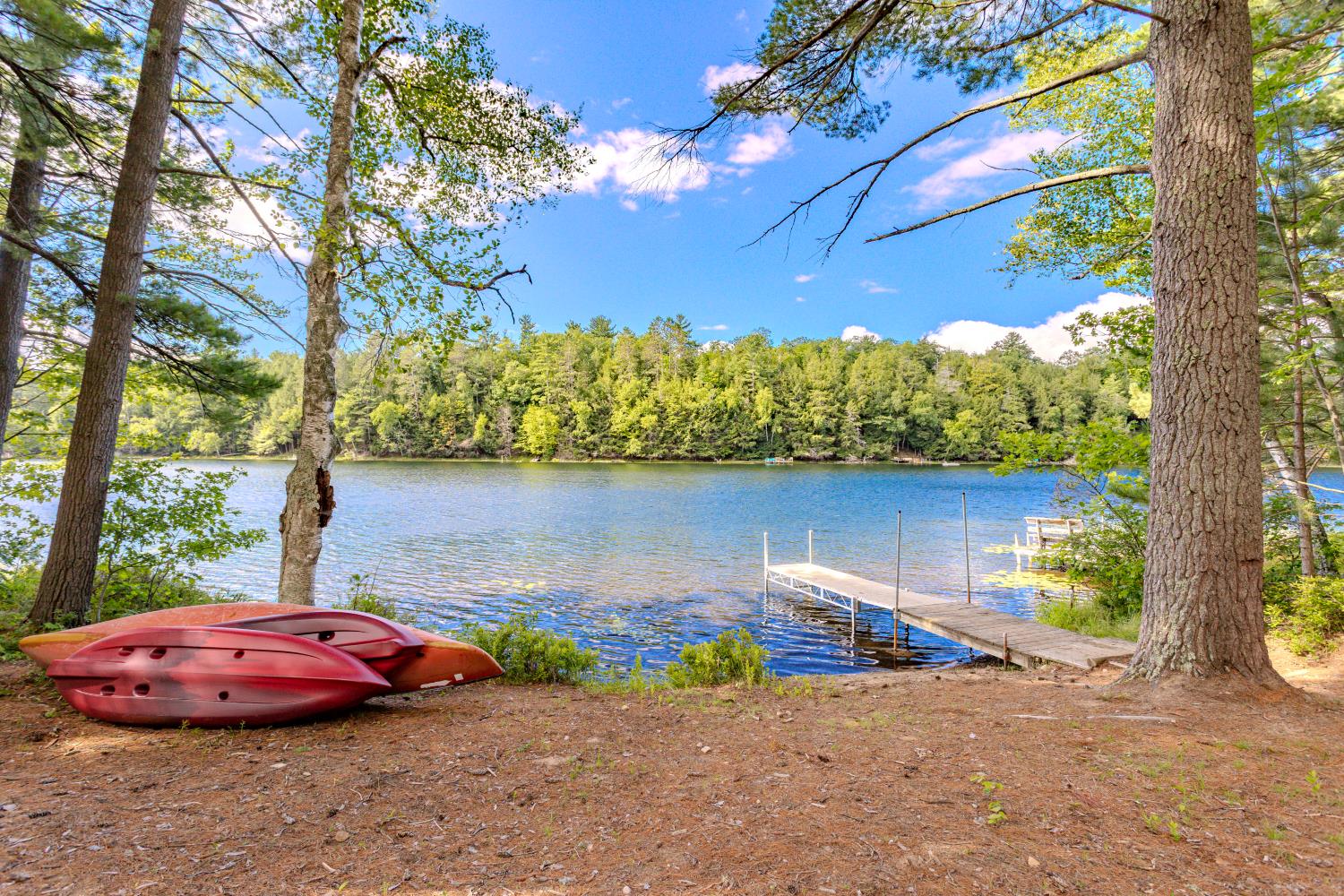 Kayaks on the sandy shoreline